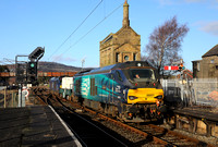 68001 arrives into Carnforth on 1.2.23 with 6C51 Sellafield to Heysham.