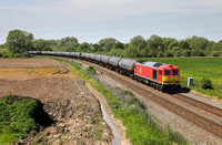 60015 heads away from Stenson Jc on 24.5.23 with 6E54 11.04 Kingsbury to Humber Oil Refinery.