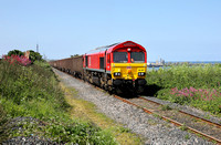 66007 heads along the Sunderland branch on 22.6.23 with 6V33 15.32 Sunderland Ward Bros to Cardiff Tidal scrap train.