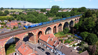 66023 in Kings Coronation Blue, heads over Yarm Viaduct on 22.6.23 with 6M16 05.40 Wilton to Knowsley Binliner.