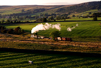 The sun sets on a excellent charter with 52322 on the Embsay line.
