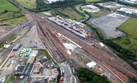 Mossend Yard from the air on 1.8.23, 66728 on the far left with Cars, a 325 in the middle and a pair of 90s on the right, by Mossend Euro terminal.