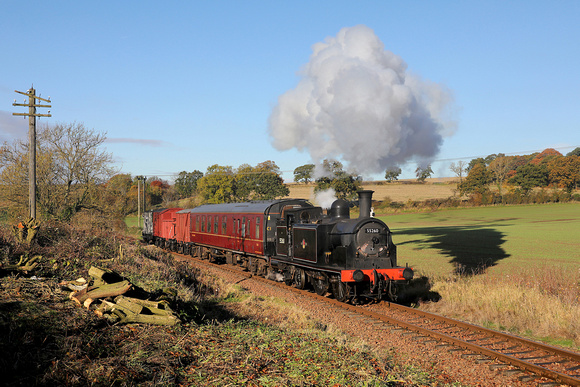 55260 approaches Birkhill on 5.11.23 during a 'In Search of Steam' photo charter.