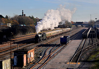 7029 heads past Small Heath with the ECS for the first  'Polar Express' of the day on 25.11.23