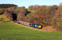 37611 drags 331009 away from Melling Tunnel on 30.11.23 with 5Q17 07.34 Allerton to Skipton Broughton Rd.
