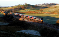 Hire in XC 43207 & 43303 head past Gilsland with the diverted 1E05 07:06 Edinburgh to Kings Cross.