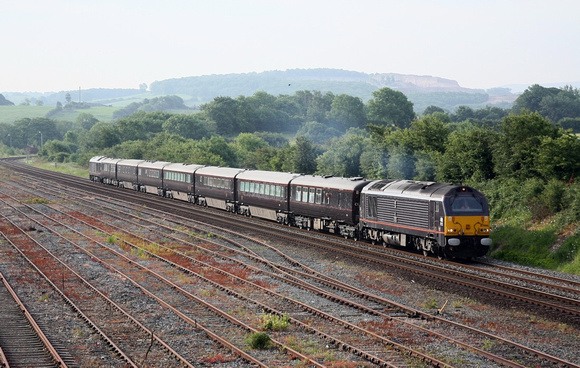 67006 & 67005 Royal Train departs Carnforth.