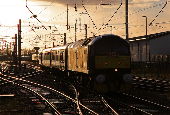 47760 heads away from Carnforth with a ECS to Doncaster on 5.12.14.