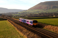 150117 heads away from Edale on 11.12.13 with a Manchester to Sheffield service.