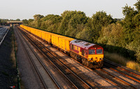 66164 approaches Hatfield & Stainforth with a Scunthorpe to Southall Binliner on 30.7.14.