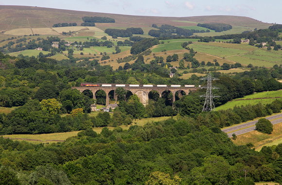 It should of been 60074!! 66018 heads the Tunstead to Lostock over Chinley viaduct.