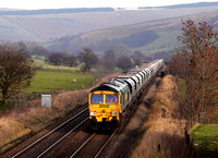 66607 heads towards Edale on 11.12.13 with its Drax to Tunstead empties.