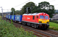 DBS 92016 passes Burton on 7.9.11 with the Tesco Express.