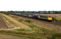 47812 & 47843 pass Burn with the Drax to Doncaster Gypsum.