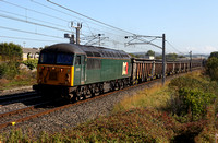 DCR 56303 heads past Carnforth on 2.9.14 with a Shap Quarry to Foxton Rugby Cement train.