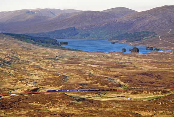 Loch Ossian in the background as 73968 approaches Corrour station on 27.5.18.