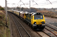 70004 & 66089 pass Hest Bank 'off ' route with the 'Scenic Settler' to Carlisle on 23.3.13.
