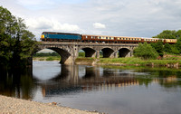 57316 heads over the River Lune at Arkholme on 16.6.13 with a ECS from Ely to Carnforth.