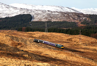 Newly liveried 67004 heads towards Achallader on 2.4.15 with Sercos Fort William sleeper service.
