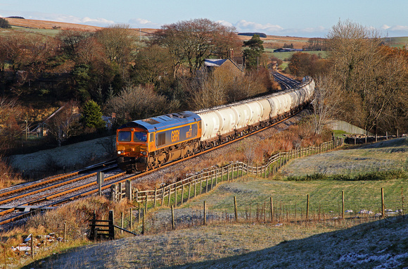 66737 heads past Gilsland on 21.11.15 with the diverted North Blyth to Fort William Alcan train.