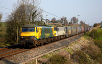 90042 & 90047 head past Bay Horse on 17.4.19 with 4M27.