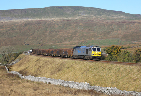 60066 passes Ribblehead on 21.10.21 with its Newbiggin to Tees Dock empties.