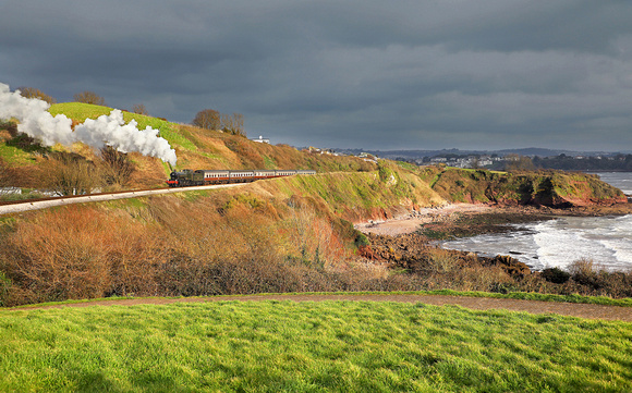 7827 heads past Saltern Cove on the Dartmouth steam Railway during a Timeline events charter on 7.3.24.