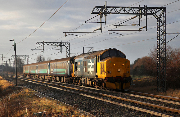 37403 heads away from Hest Bank with 10.04 Preston to Barrow on 29.12.16