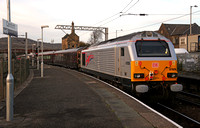 67026 heads away from Carnforth with the Royal train and nto the Cumbrian Coast.