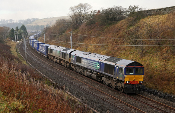 66303 & 66431 pass Lowgill with the Tesco Express on 17.11.12