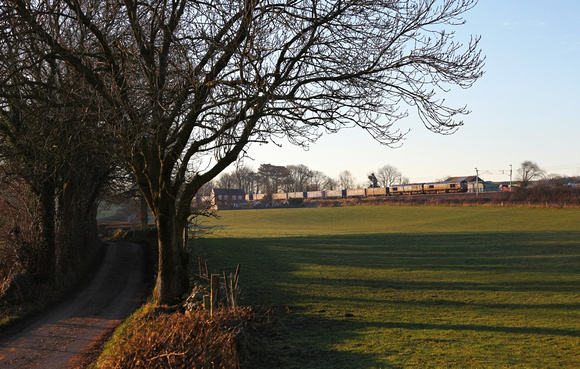 The Tesco Express with 66431 & 66428 pass Hincaster on 13.12.12