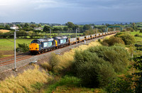 DRS 37608 & 37609 haul 4C03 Washwood Heath to Carlisle 'sleeper' train past Elmsfield on 11.9.12.