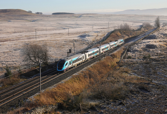A 397 glides up Shap with 1S46 10.10 Manchester Airport to Edinburgh on 1.12.19