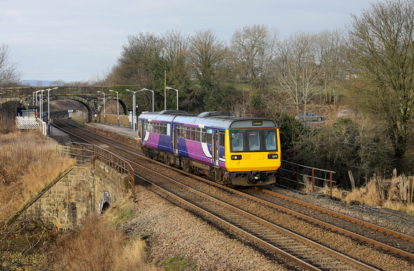142029 heads away from Long Preston on 4.12.19 with 2Y60 10.33 Morecambe to Leeds.