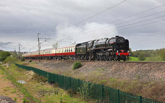 70000 passes Carnforth with the Lakelander tour to Carlisle on 13.4.24.