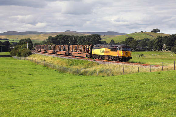 56096 gets away from Hellifield with the logs for Chirk on 24.7.23