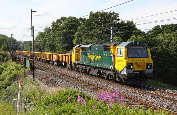 70011 passes Bay Horse with a Crewe to Carlisle departmental on 13.7.11.