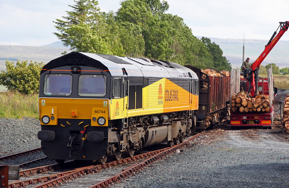 66744 waits at Ribblehead with the logs for Chirk on  19.8.11