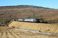 158795 & 158908 approach Ribblehead on 7.12.22 with 2H89 10.58 Carlisle to Leeds.