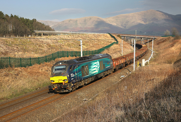 68016 passes Beckfoot on 8.3.22 with 6K05 Carlisle to Crewe engineers.