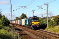 88006 heads past Bolton Le Sands on 5.7.22 with the 13,32 Coatbridge to Tilbury liner.