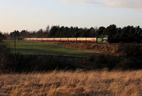 After the water stop at Blackburn, 61306 passes Hapton on 21.12.22.
