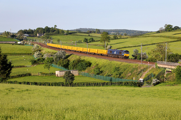 66430 passes Deepthwaite on 25.5.23 with 6C06 04.49 Crewe Bas Hall  to Shap Summit Quarry.