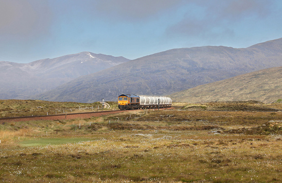 66736 passes Corrour Summit on 31.5.23 with the Fort William to North Blyth empty Alcans.