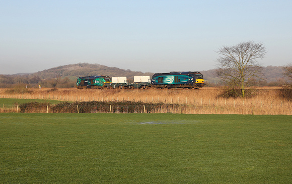 68003 & 68006 pass Crag Foot on 11.1.22 with 6C51 Sellafield to Heysham.