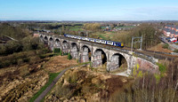 319368 heads over Sankey Viaduct  on 17.3.22 with2A94 08.27 Liverpool Lime Street to Crewe.