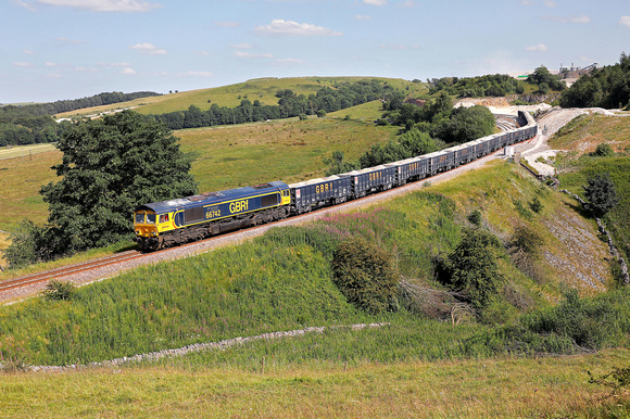 66742 departs from Hillhead sidings on 7.7.23 with a train for Hams Hall.