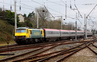 90049 heads past Carnforth on 31.10.11 with the ECS from the Omega Travels charter the day before.