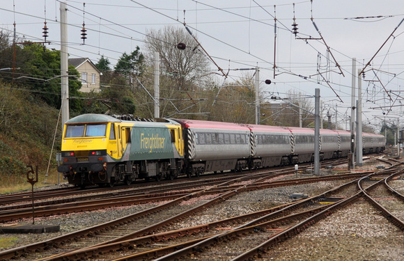 90049 heads past Carnforth on 31.10.11 with the ECS from the Omega Travels charter the day before.