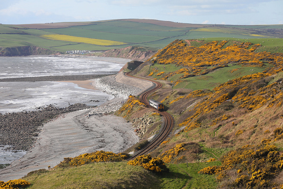 156472 heads down the Cumbrian Coast near Coulderton on 9.4.22 with the 15.12 Carlisle to Barrow.